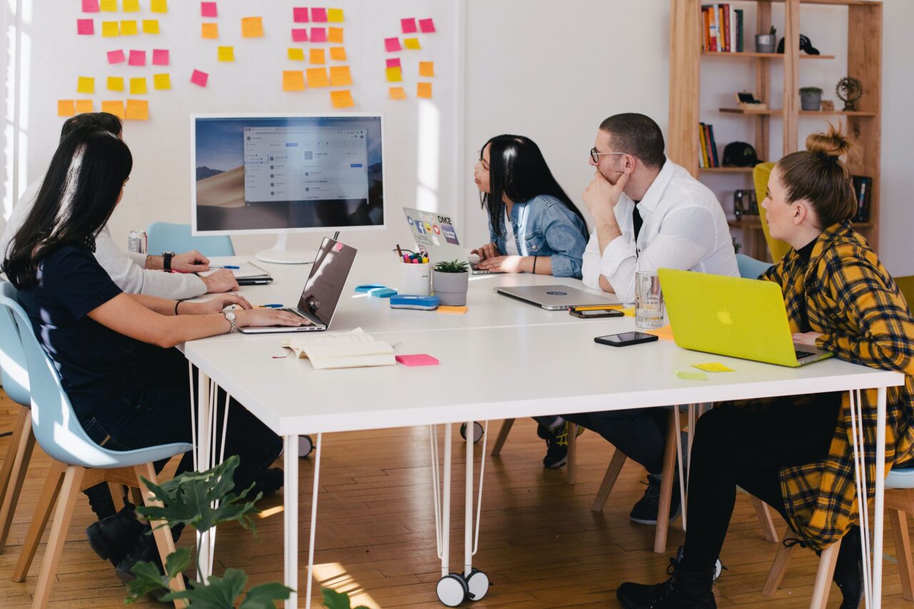 A group of people making a customer journey map