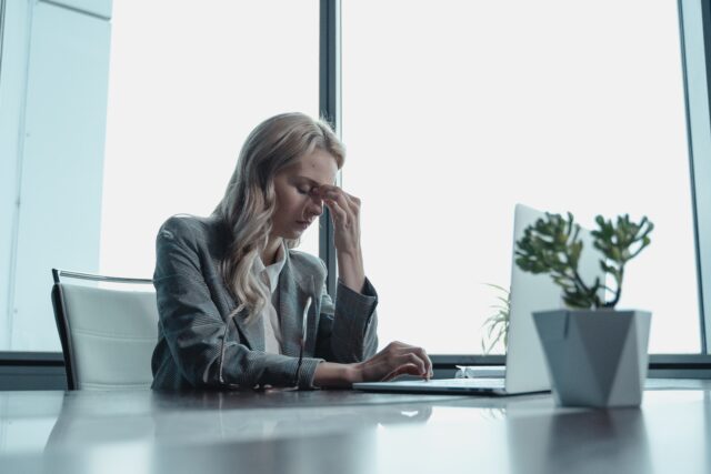 A female employee representing the benefits of remote working