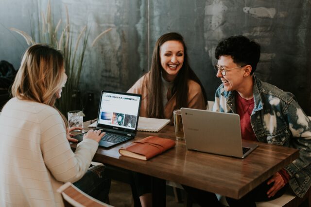Three people talking about the importance of prioritizing employee experience