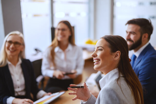 People at the meeting discuss purpose-led leadership.