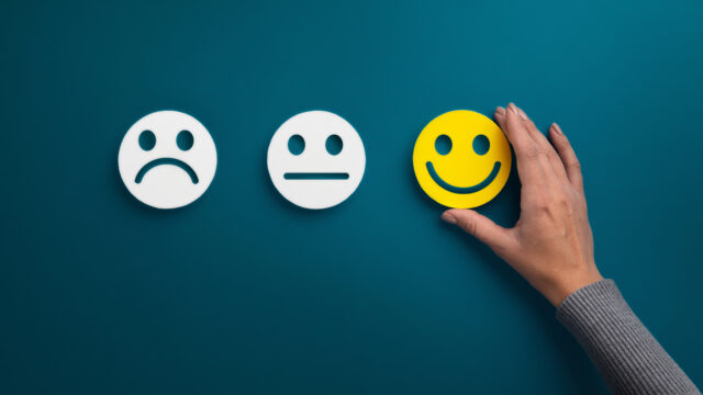 The photo shows three emoticons standing for would not recommend facial expression.