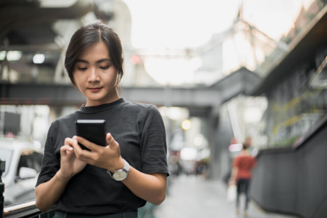 a woman consuming mobile ecommerce