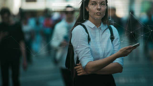an image showing a young woman being observed with the help of surveillance cameras
