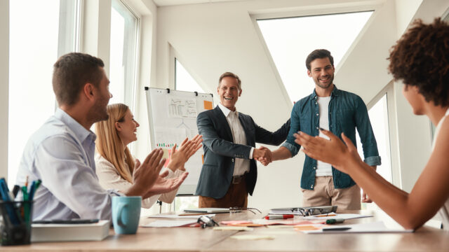 CX leaders working in a team