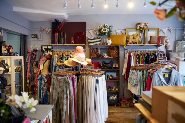 A second-hand store with clothes and household goods.