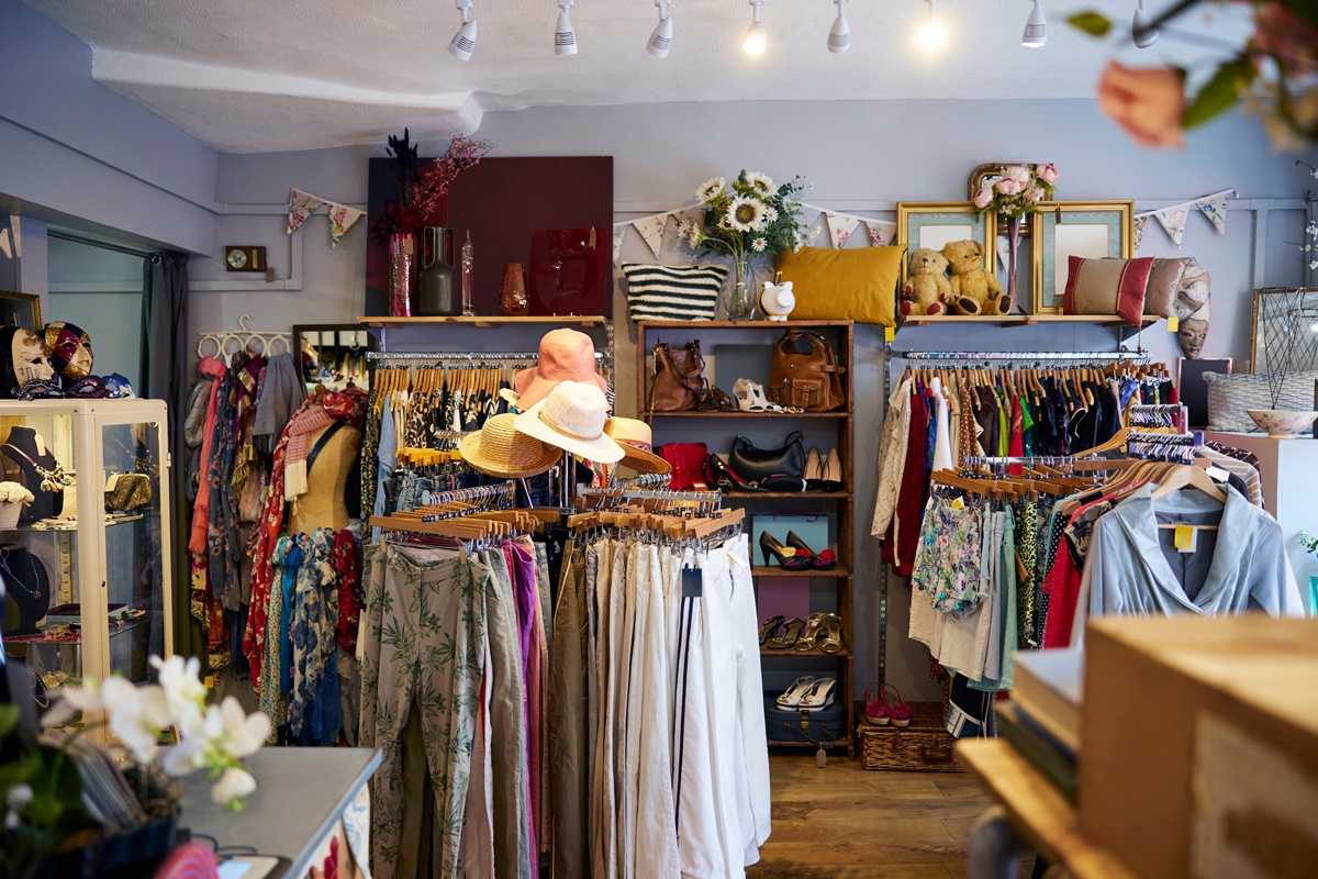 A second-hand store with clothes and household goods.