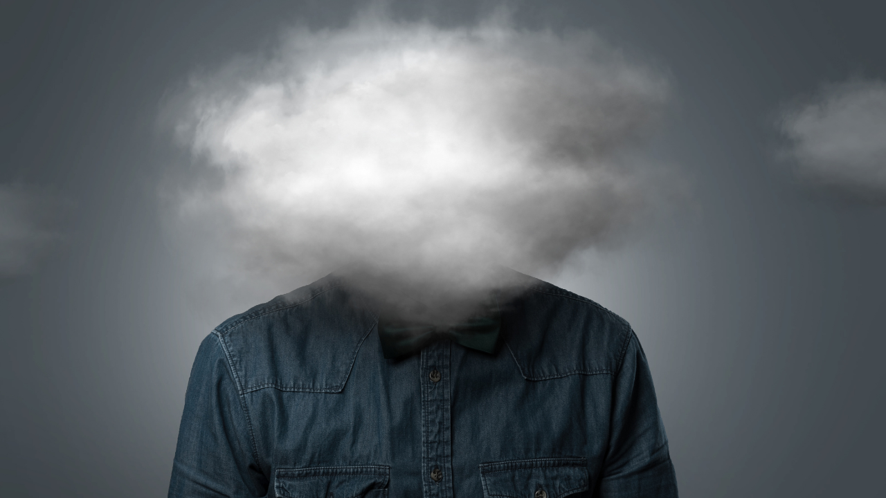 Man with cloud over heading, depicting psychosocial risk at work