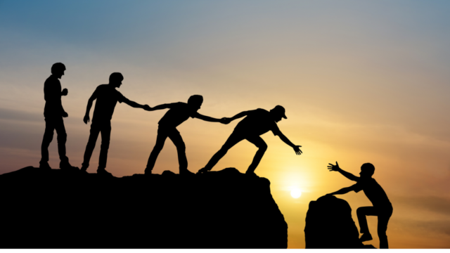 Group of people on peak mountain climbing helping team work , travel trekking success business concept, depicting manager trust skills