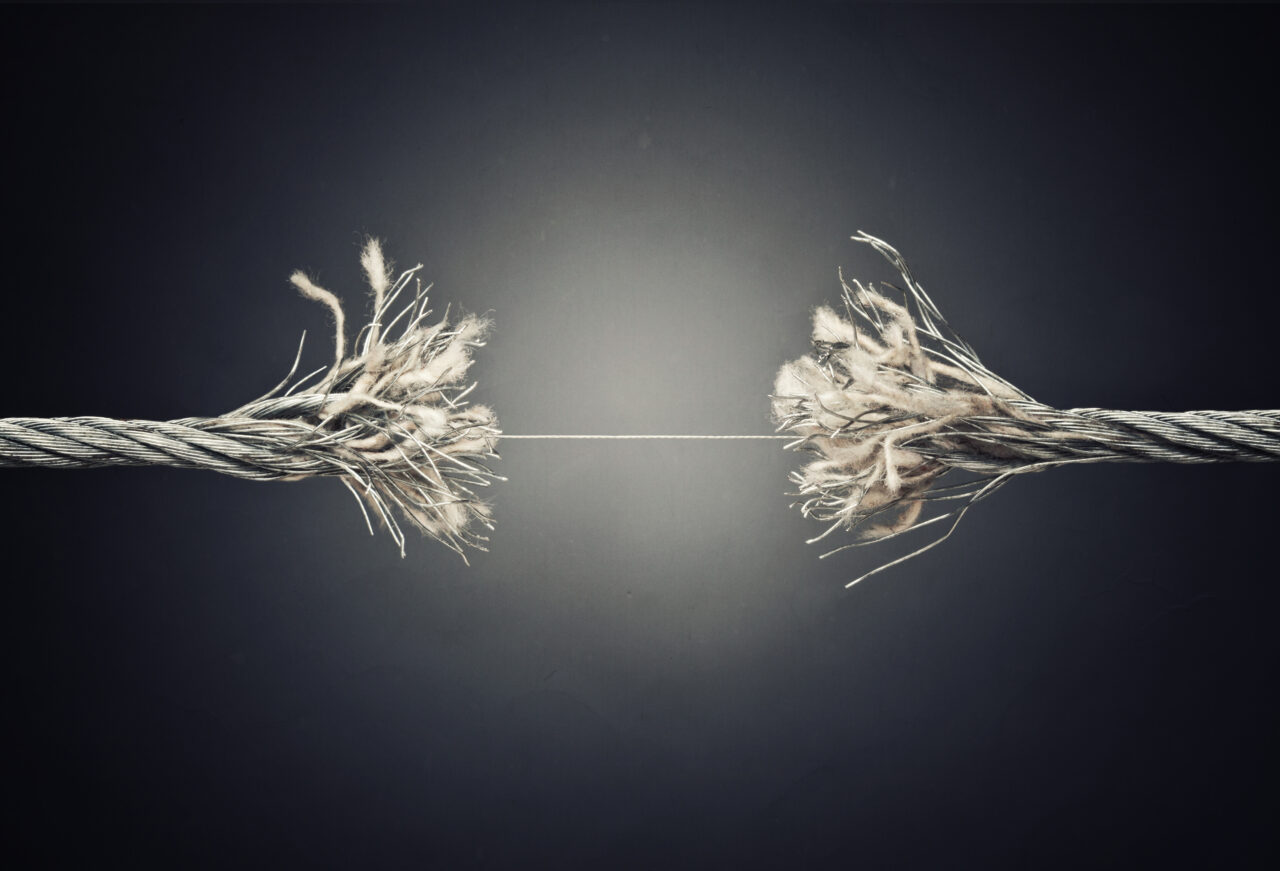 damaged steel wire near to broke crisis concept, depicting manager crisis