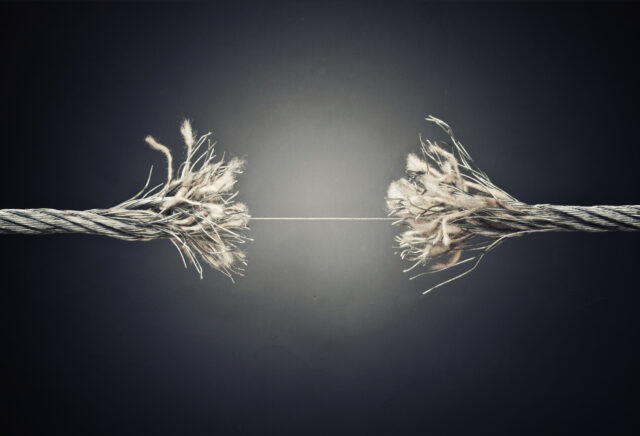 damaged steel wire near to broke crisis concept, depicting manager crisis